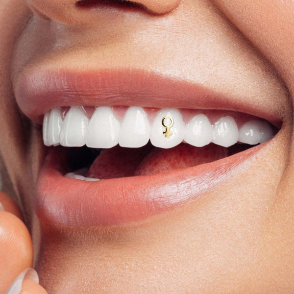 Female Sign Tooth Gem